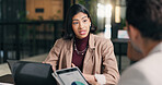 Woman, business or meeting with discussion in office for performance review, statistics or data. Female person, employee or talking with colleague, laptop or tablet for project conversation or report