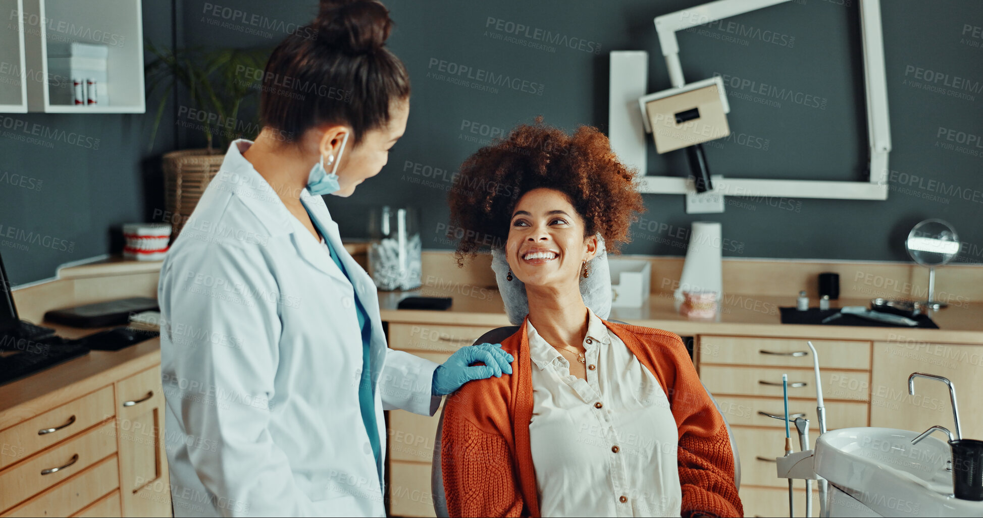 Buy stock photo Women, support and dentist with patient in clinic, helping and explaining procedure or consultation. Oral hygiene, checkup and happy person with medical professional, health and wellness in office