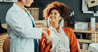 Buy stock photo Happy, handshake and dentist with woman in clinic for consultation, teeth cleaning or dental care. Oral health, shaking hands and orthodontist with patient for agreement on tooth extraction in office