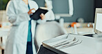 Dentist, tray and tools at clinic with tablet, dental exam and surgery for tooth extraction. Person, digital app and equipment for dentistry, oral cleaning and periodontal treatment for root canal