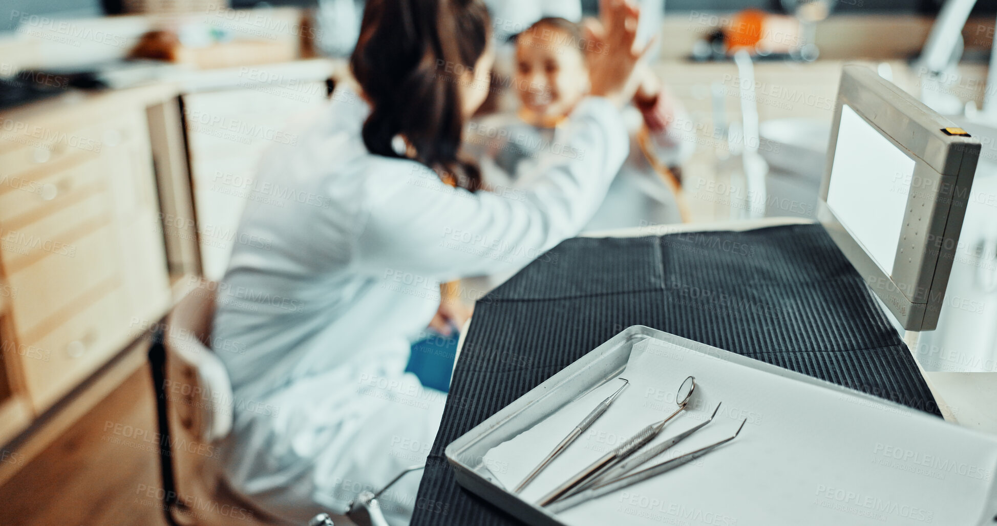 Buy stock photo Tools, high five and dentist with child in clinic for teeth whitening, oral care or dental procedure. Equipment, celebration and orthodontist with kid patient for consultation on tooth extraction.