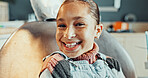 Portrait, teeth and happy girl in clinic for dental hygiene, oral healthcare or treatment. Child, kid or gum care with smile or satisfaction for dentist cleaning, checkup or appointment on chair