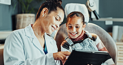 Buy stock photo Dentist, patient or happy girl with tablet for dental hygiene, results or oral treatment in clinic. Woman, orthodontist or child with smile or technology for gum care, teeth appointment or checkup