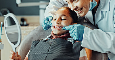 Buy stock photo Mirror, dentist and child in clinic for teeth cleaning, service or oral hygiene for wellness. Happy, orthodontist and girl kid with consultation for braces, dental care or gum health in office.