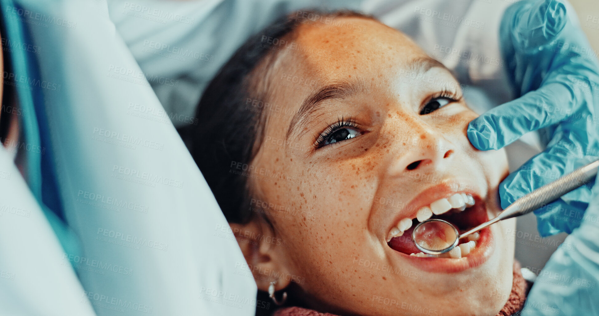 Buy stock photo Hands, dentist and child at clinic with mirror, dental exam and inspection for tooth extraction. Smile, person and kid with tools for dentistry, oral checkup and mouth assessment for teeth whitening