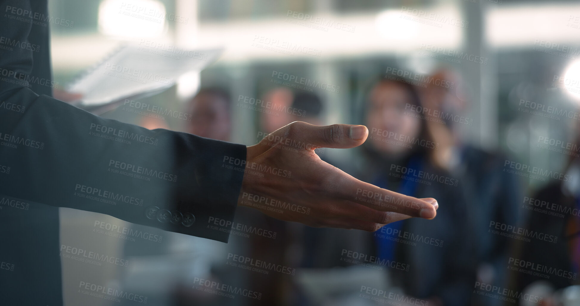 Buy stock photo Hands, speaker and presenting to audience in workshop for insight, coaching or wealth management. Seminar, presenter and document for keynote address, industry trends and financial literacy at event