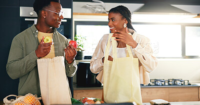 Buy stock photo Unpacking, grocery and couple with apples in kitchen, black man and woman with healthy food in home. Happy people, bonding and shopping bags with fruit, love and relationship commitment in house