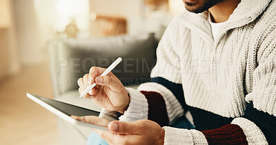 Buy stock photo Hands, tablet and man with pen on sofa for remote work, web design and research for project. Freelancer, home and person with tech, stylus and internet for digital ui, planning and website content