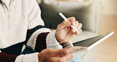 Buy stock photo Hands, tablet and man with pen for remote work, web design and research for project on sofa. Freelancer, home and person with tech, stylus and internet for digital ui, planning and website content
