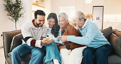 Buy stock photo Phone, conversation and couple with senior parents on sofa for social media, texting or reading blog. Learning, cellphone and people teaching elderly mom and dad on mobile app in living room at house
