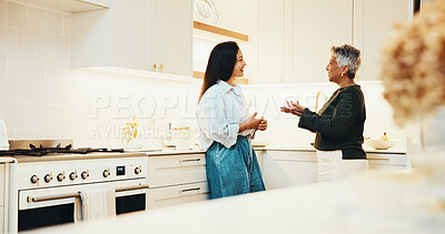 Buy stock photo Kitchen, woman and conversation with senior mother for care, advice and support with smile. Adult daughter, parent and talking in home with happiness, bonding together and connection for family love