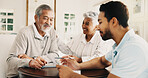 Old couple, smile and financial advisor with documents in home, asset management and savings review. Happy, senior people and planning for retirement with wealth manager, reading and pension fund