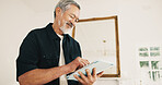 Senior, man and typing in living room with tablet, internet connection and browse website for ebook. Happy, elderly Asian person and scroll in home with tech, online story and retirement wellness.