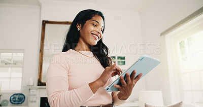 Buy stock photo Tablet, freelancer and woman in home with research, story editing or happy with manuscript draft. Tech, remote work and person reading review on internet, creative chapter and author publication