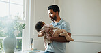 Father, sleeping and baby at house with love, nap time and bonding together for nurturing. Man, holding and asleep infant in lounge for parenting, support and emotional connection for weekend unwind