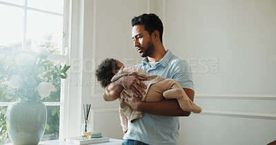 Buy stock photo Father, sleeping and baby at house with love, nap time and bonding together for nurturing. Man, holding and asleep infant in lounge for parenting, support and emotional connection for weekend unwind