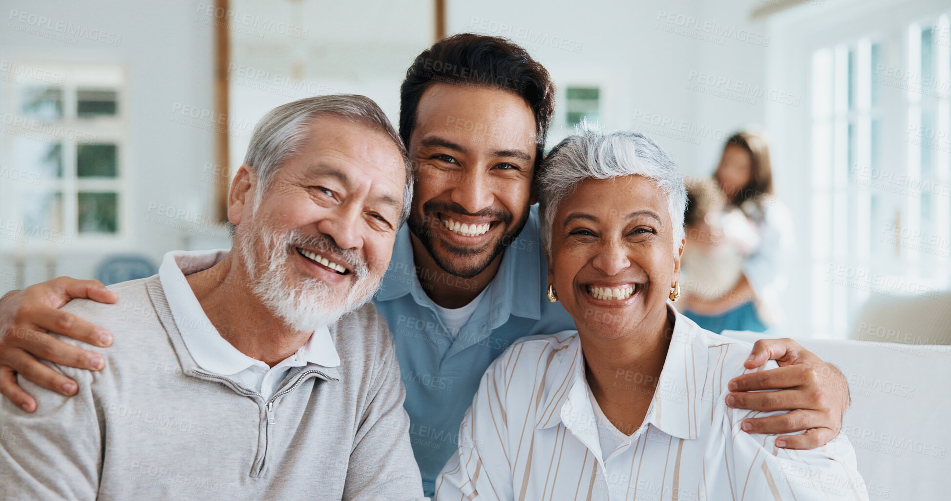 Buy stock photo Happy, portrait and man with senior parents in home for bonding, relax and hug on weekend visit. Family, house and person with elderly mom and dad for relationship, support and embrace for love