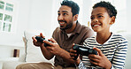 Happy, sofa and dad with child for video games, online competition and bonding on weekend. Family, home and excited boy with father, controller and gaming for entertainment, fun and relax together