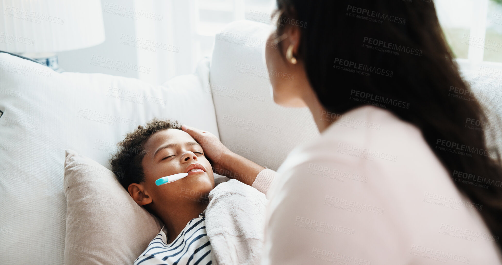 Buy stock photo Comfort, mom and kid in home with thermometer, childcare and health monitor with flu symptoms. Support, mother or child in living room with tech, parenthood or temperature check in illness assessment