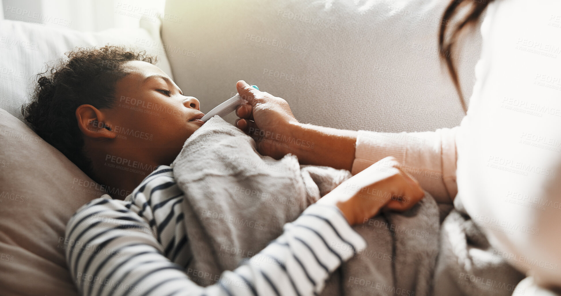Buy stock photo Sick, mom and kid on couch with thermometer, childcare and health monitor with flu symptoms. Support, mother and child in house with tech, parenthood and temperature check in illness assessment.