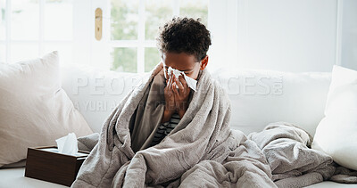 Buy stock photo Sick, tissue and child on sofa with blanket for virus, sinus infection or blowing nose for flu. Home, health and boy with napkin, respiratory disease or allergy for recovery, healing or rest on couch