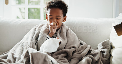 Buy stock photo Sick, cough and child on sofa with blanket for virus, sinus infection and blowing nose for flu. Home, health and boy with napkin, respiratory disease and cold for recovery, healing and rest on couch