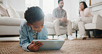 Family, child and tablet with relax on floor in living room of home for learning or online gaming. App, development and parents with boy in house together for tech, education or streaming service