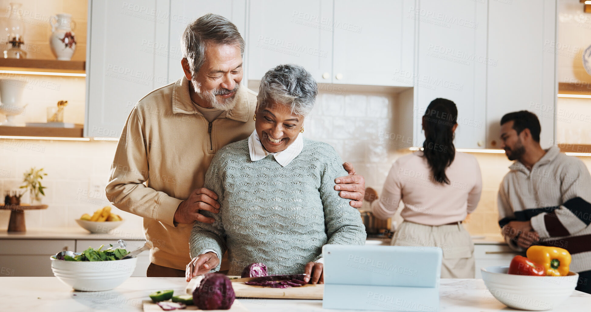 Buy stock photo Cooking, tablet and senior people in kitchen at house for preparing meal together on weekend. Couple, digital technology and elderly man with woman for online recipe with nutrition dinner in home.