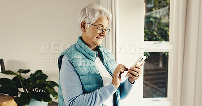 Buy stock photo Text, old woman and reading at house with phone, social media and browsing online for bingo. Message, senior person and scroll in home with mobile app, internet search or download games on retirement