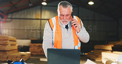 Buy stock photo Carpentry, laptop and phone call with man in warehouse for feedback, online report or review. Computer, communication and order schedule with mature engineer in woodworking plant for stock management
