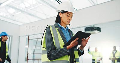 Buy stock photo Engineer, woman and research at construction site with tablet, building regulations or compliance. Person, reading and PPE with tech to check safety policy, engineering project and design evaluation.