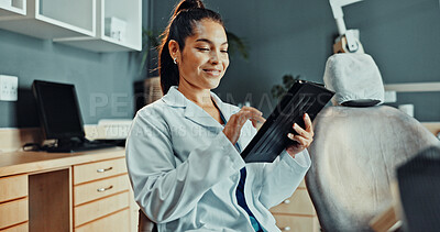 Buy stock photo Happy, dentist and reading at clinic with tablet, research and test results for dental care. Smile, woman and review with digital app for dentistry, appointment details and information for treatment