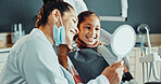 Woman, dentist and child with mirror for dentistry, results and satisfaction of teeth whitening. Smile, person and patient at dental clinic for checkup, cleaning mouth and treatment for oral hygiene