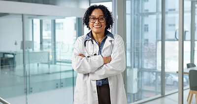 Buy stock photo Happy, woman and doctor at hospital with portrait, career pride and about us for medical wellness. Smile, mature person and crossed arms in workplace with ambition, consultant and healthcare services