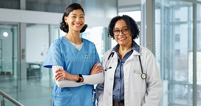 Buy stock photo Portrait, doctor and nurse at hospital with smile, career pride and about us for medical wellness. People, team and crossed arms in workplace with ambition, positive attitude and healthcare services