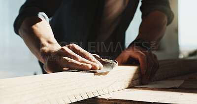 Buy stock photo Hands, carpenter and sandpaper at site with wood, restoration and furnishing for expansion. Person, sanding or carpentry with timber for construction, smoothing surface and woodworking for renovation
