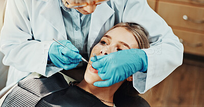 Buy stock photo Consultation, orthodontist and woman in clinic for teeth cleaning, extraction or dental health. Medical checkup, oral hygiene and dentist with patient for root canal or whitening treatment in office.
