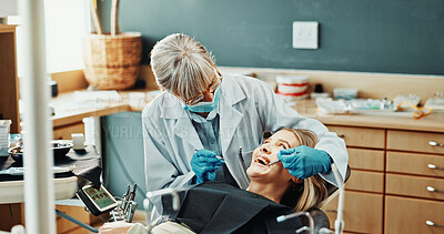 Buy stock photo Consultation, dentist and woman in clinic for teeth whitening, extraction or dental health. Medical checkup, oral hygiene and orthodontist with patient for root canal or cleaning treatment with tools