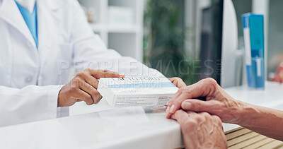 Buy stock photo Hands, pharmacist and old person with box for medicine, dosage and information for side effects. Assistant, helping and senior patient at pharmacy with drugs, prescription and constipation treatment