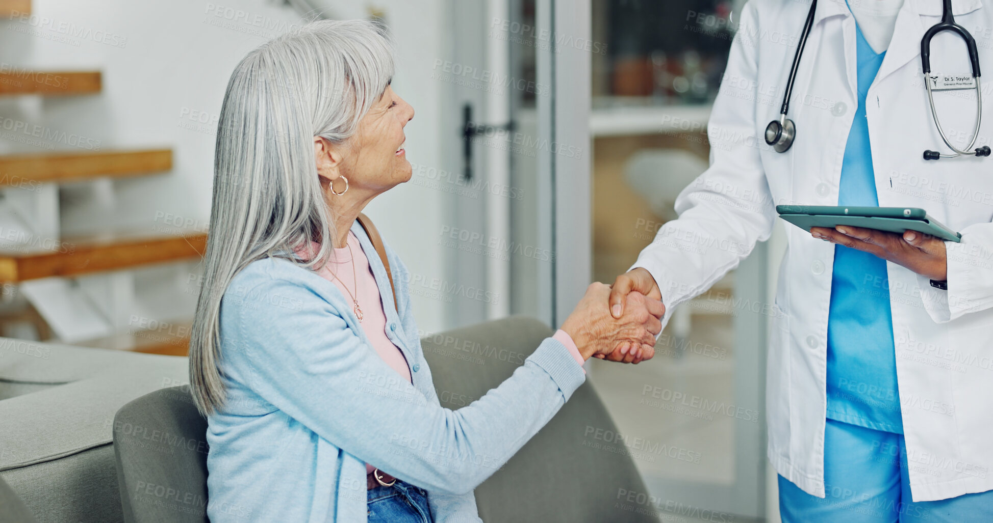 Buy stock photo Doctor, handshake and old woman in clinic with greeting, tablet and medical appointment for wellness. Happy, senior person and healthcare worker shaking hands with tech, discussion and consultation.