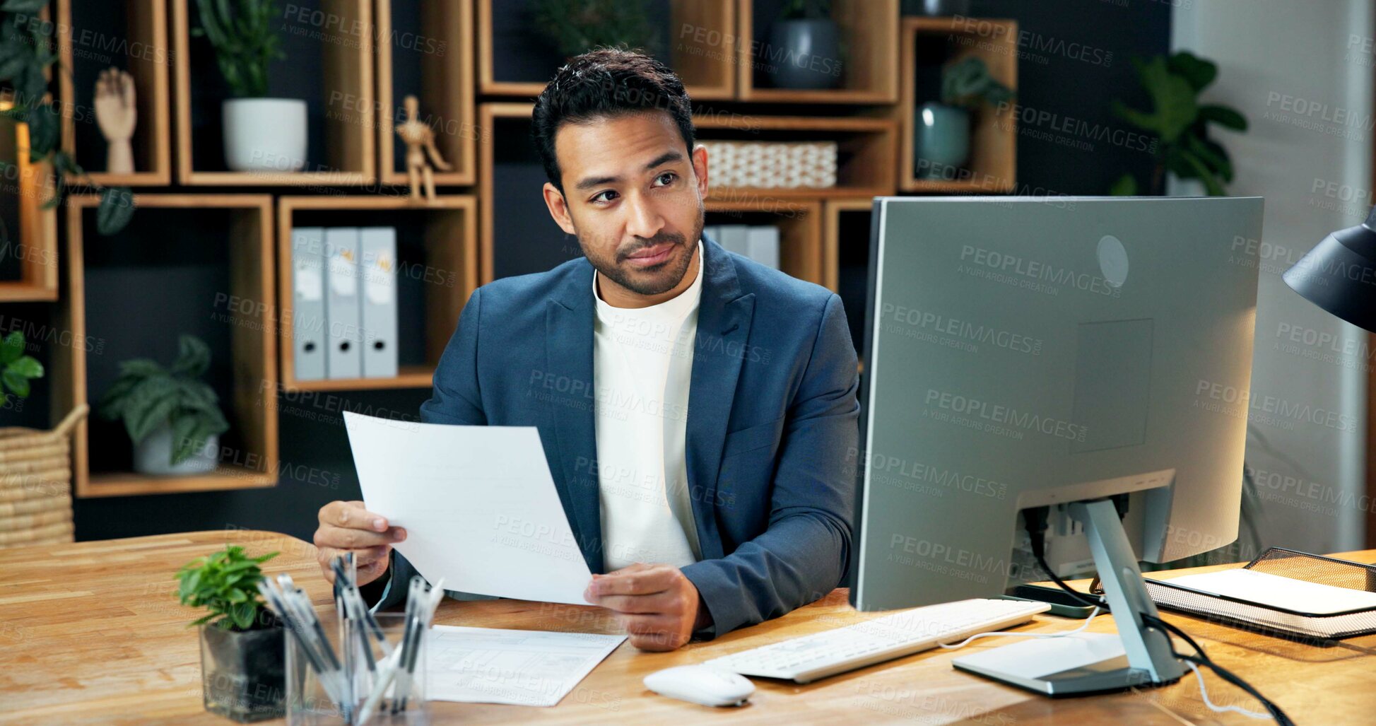 Buy stock photo Man, paperwork and computer in office for finance, invoice comparison or information for business. Accountant, tech and document in agency for financial statement, reading or investment policy update