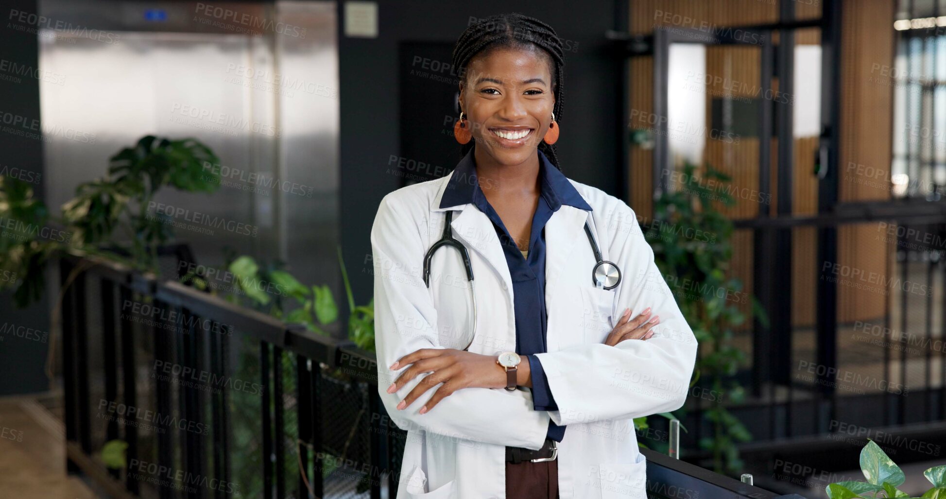Buy stock photo Portrait, doctor or black woman with pride for medical assistance, help or hospital support. Female person, healthcare worker or professional with smile or arms crossed for health advice or service