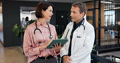 Buy stock photo Doctor, team and talking at hospital with tablet, research and blood test results for diagnosis. People, chat and collaboration at clinic with digital, mri scan report and medical records for health
