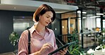 Woman, business and research with tablet in office for social media, news update or information. Female person, journalist or reporter with technology for online story, ebook or article in workplace