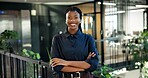 Business, confidence or black woman with plants in office for eco friendly startup or project. Portrait, female person or environment campaign manager with smile or arms crossed for economic growth