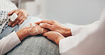 Medical, doctor or patient in hospital with holding hands, comforting or empathy for diagnosis. Space, person or surgeon in clinic with consoling, understanding or sympathy for healthcare results.