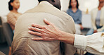 Counseling, group and hands in clinic with support, compassion and empathy in mental health center. Back, people or psychologist with comforting, understanding or sympathy in peer therapy session.
