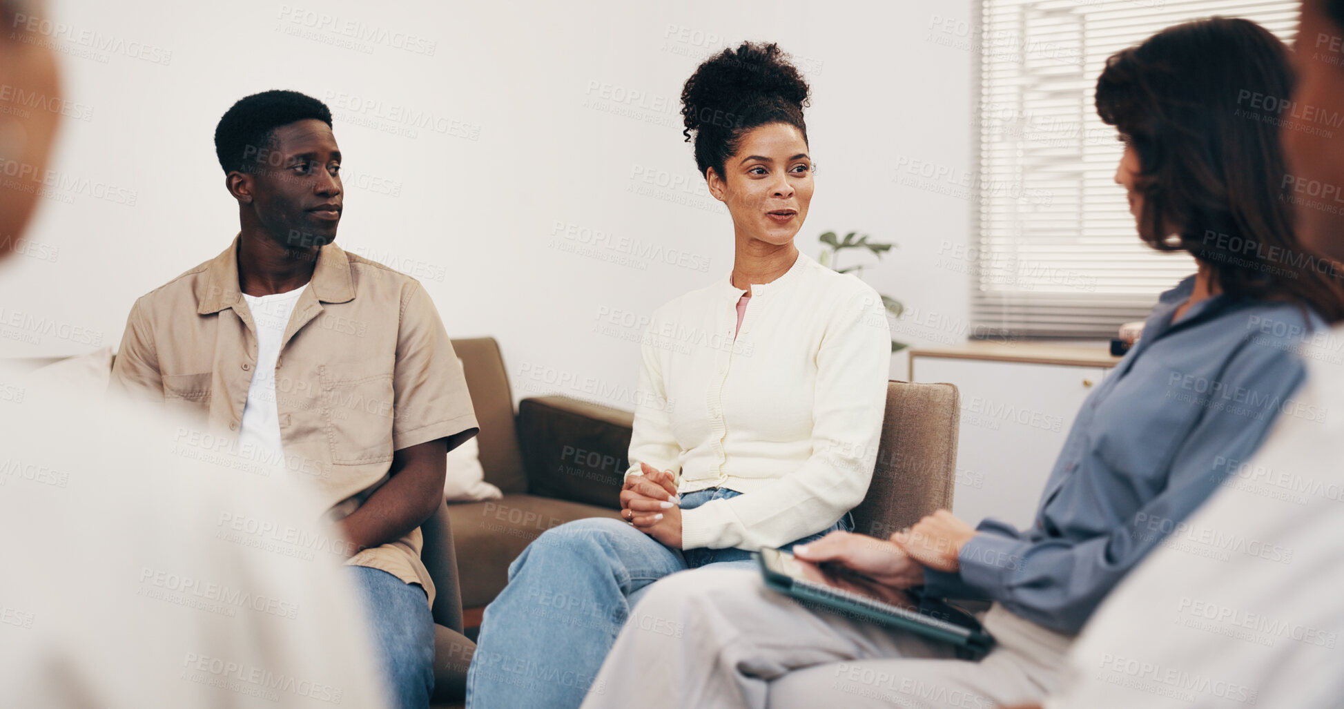 Buy stock photo Psychology, woman and happy with talk for group therapy, addiction recovery and support in healing. Rehabilitation, people and member in counseling for relapse prevention, share story and improvement