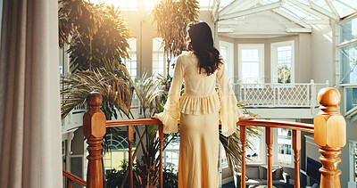Buy stock photo Back, woman and balcony at resort for holiday, adventure and guest exploring at accommodation. Female person, tourist and terrace at retreat with scenic view, travel experience and weekend vacation