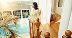 Smile, woman and balcony at resort for holiday, adventure and check in at luxury accommodation. Profile, mature person or staircase at retreat with scenic view, travel experience and weekend vacation